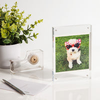 Acrylic Photo Frame in Large with a photo on a table setting. 