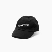 Thinking Cap in Black on a white background.